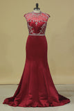 2024 Open Back High Neck Mermaid Prom Dresses Satin With Ruffles And PDEAPFNC